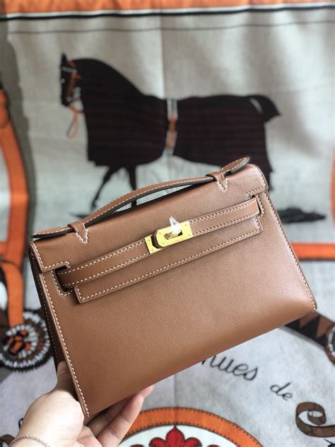 hermes mini kelly wallet.